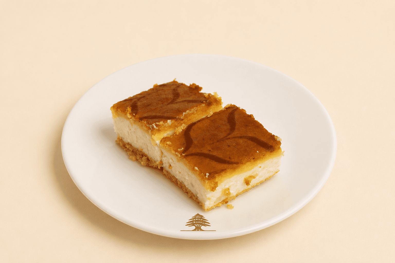 Sfouf semolina cake layered with ashta cream and a golden top